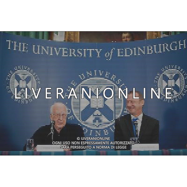 (120706) -- EDINBURGH, July 6, 2012 () -- Professor Peter Higgs (L) and Professor Richard Kenway, Chair of the Higgs Centre for Theoretical Physics, speaks during a press conference at Edinburgh University, Britain, July 6, 2012. Professor Peter Higgs is in focus of spotlight after recent finding about Higgs boson, a particle named after him and often nicknamed God Particle. (/Yao Hui) AG ALDO LIVERANI S A S ONLY ITALY