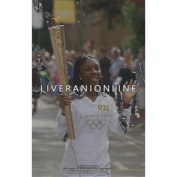 Torchbearer 022 Hannah Agyeman-Prempeh carries the Olympic Flame on the Torch Relay leg between Harlow and Waltham Cross. /PHOTOSHOT/AG ALDO LIVERANI SAS - ITALY ONLY -