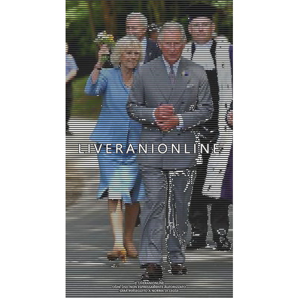 The Prince of Wales and the Duchess of Cornwall walk through Saumarez Park in Guernsey, as they continue their visit to the Channel Islands. ©photoshot/AGENZIA ALDO LIVERANI SAS - ITALY ONLY - REALI INGLESI: Il principe Carlo d\'inghilterra e la moglie Camilla in visita alle Isole Normanne. 