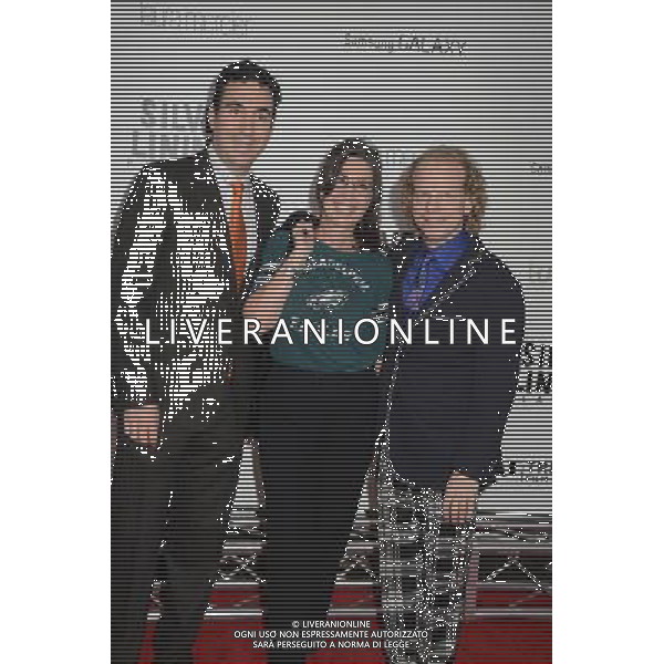 producers Jonathan Gordon, Donna Gigliotti and Bruce Cohen attends the New York Premiere of \' Silver Linings Playbook\' on November 12, 2012 at the Ziegfeld Theatre in New York City. The movie stars Bradley Cooper, Robert De Niro, Jacki Weaver, Chris Tucker, Julia Stiles, John Ortiz, Brea Bee, Anupam Kher, Shea Whigham and is directed by David O. Russell. /AGENZIA ALDO LIVERANI SAS/ITALY ONLY - EDITORIAL USE ONLY