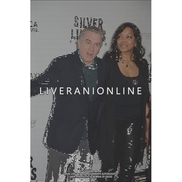 Robert De Niro and wife Grace Hightower attend the New York Premiere of \' Silver Linings Playbook\' on November 12, 2012 at the Ziegfeld Theatre in New York City. The movie stars Bradley Cooper, Robert De Niro, Jacki Weaver, Chris Tucker, Julia Stiles, John Ortiz, Brea Bee, Anupam Kher, Shea Whigham and is directed by David O. Russell. /AGENZIA ALDO LIVERANI SAS/ITALY ONLY - EDITORIAL USE ONLY