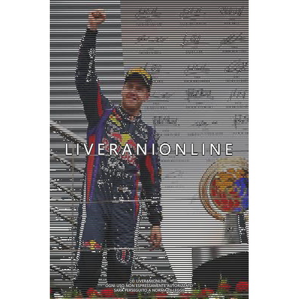 Race winner Sebastian Vettel (GER) Red Bull Racing celebrates on the podium. 06.10.2013. Formula 1 World Championship, Rd 14, Korean Grand Prix, Yeongam, South Korea, Race Day. - www.xpbimages.com, EMail: requests@xpbimages.com - copy of publication required for printed pictures. Every used picture is fee-liable. © Copyright: Photo4 / XPB Images AG ALDO LIVERANI SAS ONLY ITALY