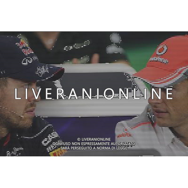 (L to R): Sebastian Vettel (GER) Red Bull Racing and Jenson Button (GBR) McLaren in the FIA Press Conference. 10.10.2013. Formula 1 World Championship, Rd 15, Japanese Grand Prix, Suzuka, Japan, Preparation Day. - www.xpbimages.com, EMail: requests@xpbimages.com - copy of publication required for printed pictures. Every used picture is fee-liable. © Copyright: Moy / XPB Images AG ALDO LIVERANI SAS ONLY ITALY