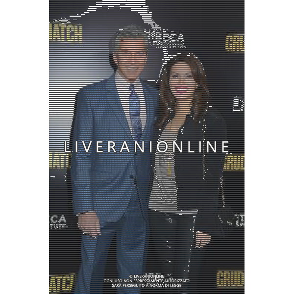 Michael Buffer and wife Christine attend the World Premiere of \'Grudge Match\' at the Ziegfeld Theatre in New Yok City on December 16, 2013. @Photoshot/Ag. Aldo Liverani s.a.s.-Only Italy-Editorial Use Only