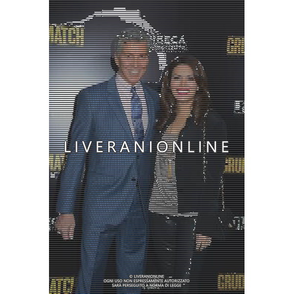 Michael Buffer and wife Christine Buffer attend the World Premiere of \'Grudge Match\' at the Ziegfeld Theatre in New Yok City on December 16, 2013. @Photoshot/Ag. Aldo Liverani s.a.s.-Only Italy-Editorial Use Only