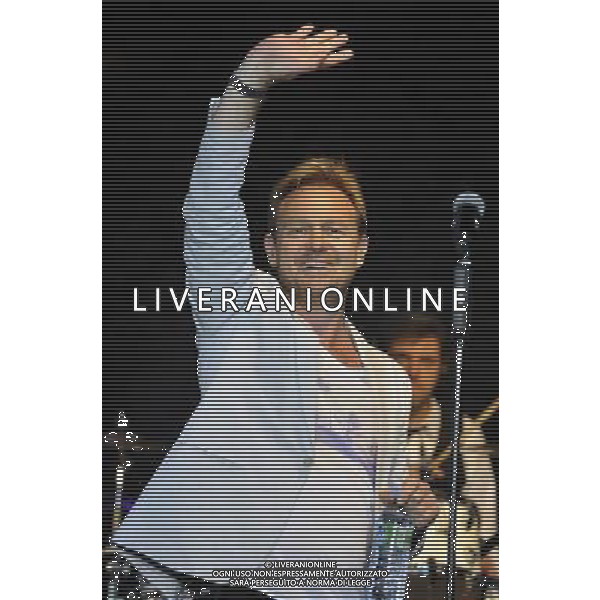 Jason Donovan performs on stage at the Hampton Court Palace Festival, East Molesey, Surrey on Friday 20 June 2014. ©PHOTOSHOT/AGENZIA ALDO LIVERANI SAS - ITALY ONLY - EDITORIAL USE ONLY