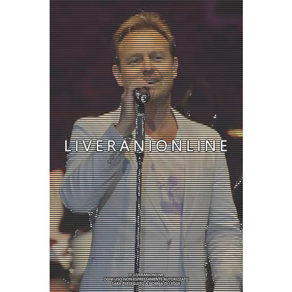 Jason Donovan performs on stage at the Hampton Court Palace Festival, East Molesey, Surrey on Friday 20 June 2014. ©PHOTOSHOT/AGENZIA ALDO LIVERANI SAS - ITALY ONLY - EDITORIAL USE ONLY