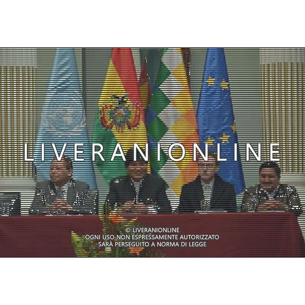 (140624) -- LA PAZ, June 24, 2014 () -- Bolivia\'s President, Evo Morales (2nd L) attends the presentation of United Nations Office on Drugs and Crime (UNODC) report on coca leaf plantations, in La Paz, Bolivia, on June 23, 2014. According to the report, Bolivia decreased by 9 per cent the coca leaf plantations between 2012 and 2013. (/Jorge Mamani/ABI) (rh) (rt) (zjl) ©PHOTOSHOT/Agenzia Aldo Liverani sas - ITALY ONLY - EDITORIAL USE ONLY