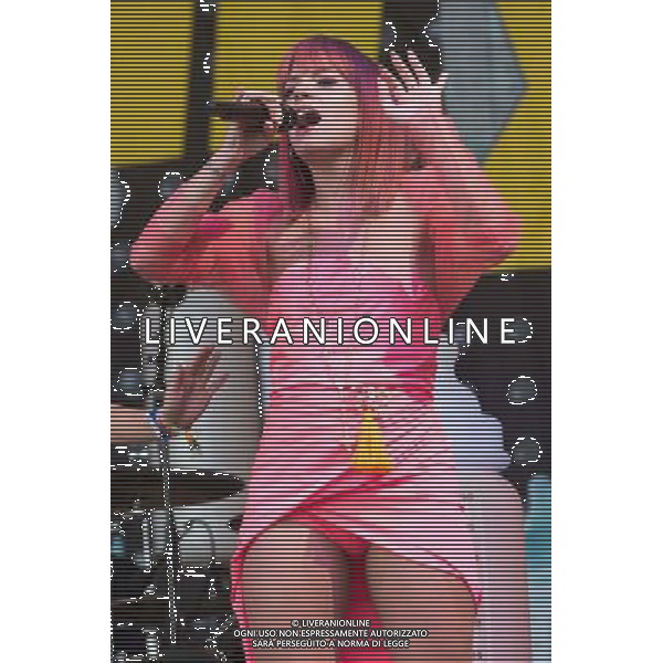 Lily Allen (born Lily Rose Allen) performs at Glastonbury Festival 2014, Worthy Farm, Pilton, Somerset, UK on Friday 27th June 2014. The Pyramid and Other Stages were closed and power shut whilst a lightning storm struck the festival. AG ALDO LIVERANI SAS ONLY ITALY
