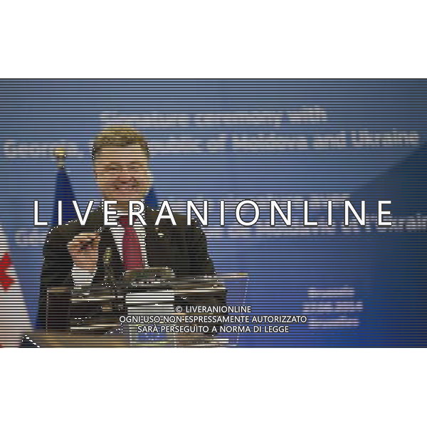 (140627) -- BRUSSELS, June 27, 2014 () -- Ukrainian President Petro Poroshenko speaks during the signing ceremony, in Brussels, Belgium, June 27, 2014. The European Union (EU) signed the Association Agreements with Ukraine, Georgia and Moldova on Friday with the aim of deepening political and economic ties with the three former Soviet republics(/The Council of the European Union) (lyi) *NO COMMERCIAL USE* AG ALDO LIVERANI SAS ONLY ITALY