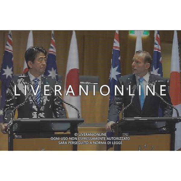 (140708) -- CANBERRA, July 8, 2014 () -- Australian Prime Minister Tony Abbott (R) speaks during a joint press conference with Visiting Japanese Prime Minister Shinzo Abe in Canberra, Australia, July 8, 2014. (/Xu haijing) (lyi) AG ALDO LIVERANI SAS ONLY ITALY