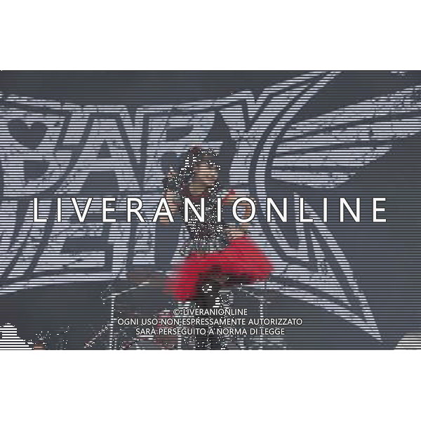 J-Metal group Babymetal perform on the main stage at Sonisphere Festival, Knebworth, UK on 5th July 2014. The band consists of Suzuka Nakamoto (Su-Metal - wearing two gloves), Moa Kikuchi (Moametal - wearing glove on left hand) and Yui Mizuno (Yuimetal - wearing glove on right hand) ©PHOTOSHOT/Agenzia Aldo Liverani sas - ITALY ONLY - EDITORIAL USE ONLY - Il Gruppo Babymetal J-Metal si esibisce sul palco de Festival Sonisphere, Knebworth, Regno Unito il 5 luglio 2014