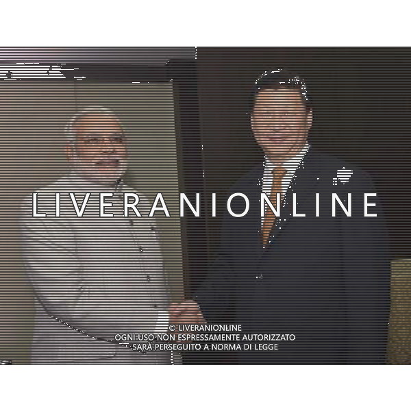 (140714) -- FORTALEZA, July 14, 2014 () -- Chinese President Xi Jinping(R) meets with Indian Prime Minister Narendra Modi in Fortaleza, Brazil, July 14, 2014. (/Li Xueren) (yxb) ©PHOTOSHOT/Agenzia Aldo Liverani sas - ITALY ONLY - EDITORIAL USE ONLY