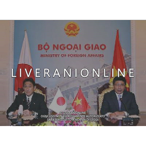 (140801) -- HANOI, Aug. 1, 2014 (Xinhua) -- Japanese Foreign Minister Fumio Kishida (L) and Vietnamese Deputy Prime Minister and Foreign Minister Pham Binh Minh attend a press conference in Hanoi, capital of Vietnam, Aug. 1, 2014. Japan will provide six used vessels and equipments to Vietnam for ensuring maritime security within the framework of a non-project aid package, said visiting Japanese foreign minister Fumio Kishida here Friday. (Xinhua/VNA) ****Authorized by ytfs**** ©PHOTOSHOT/Agenzia Aldo Liverani sas - ITALY ONLY - EDITORIAL USE ONLY