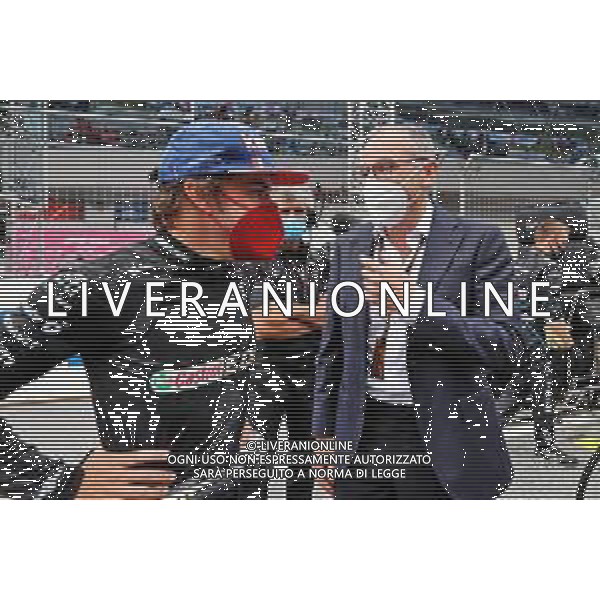 (L to R): Fernando Alonso (ESP) Alpine F1 Team with Stefano Domenicali (ITA) Formula One President and CEO on the grid. 04.07.2021. Formula 1 World Championship, Rd 9, Austrian Grand Prix, Spielberg, Austria, Race Day. - www.xpbimages.com, EMail: requests@xpbimages.com © Copyright: Moy / XPB Images/AG. ALDO LIVERANI SAS - ITALY ONLY - EDITORIAL USE ONLY