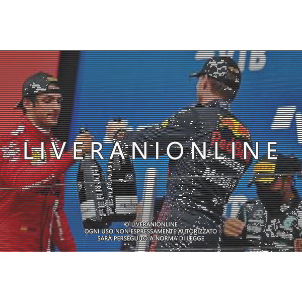 (L to R): Carlos Sainz Jr (ESP) Ferrari celebrates his third position on the podium with second placed Max Verstappen (NLD) Red Bull Racing. 26.09.2021. Formula 1 World Championship, Rd 15, Russian Grand Prix, Sochi Autodrom, Sochi, Russia, Race Day. - www.xpbimages.com, EMail: requests@xpbimages.com © Copyright: Moy / XPB Images/AGENZIA ALDO LIVERANI SAS - ITALY ONLY EDITORIAL USE ONLY