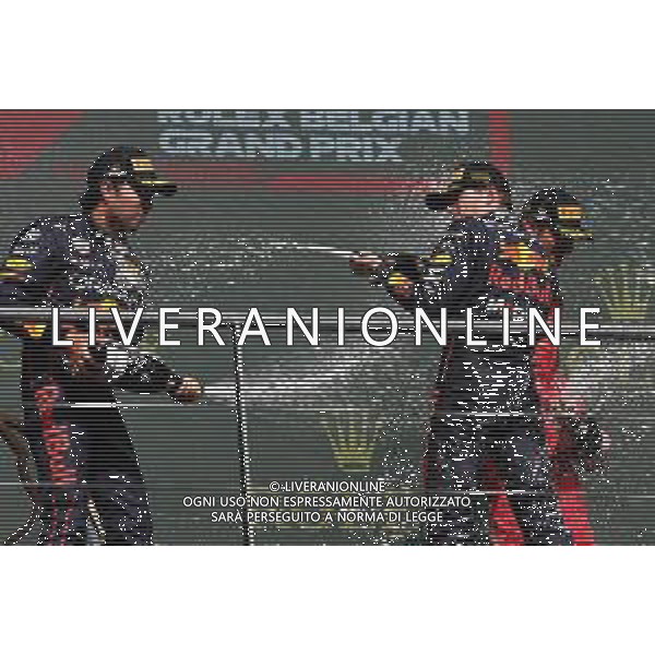 1st place Max Verstappen (NLD) Red Bull Racing RB18, 2nd place Sergio Perez (MEX) Red Bull Racing RB18 and 3rd place Carlos Sainz Jr (ESP) Ferrari F1-75. 28.08.2022. Formula 1 World Championship, Rd 14, Belgian Grand Prix, Spa Francorchamps, Belgium, Race Day. - www.xpbimages.com, EMail: requests@xpbimages.com ¬© Copyright: Batchelor / XPB Images/AGENZIA ALDO LIVERANI SAS - ITALY ONLY EDITORIAL USE ONLY